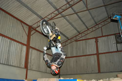 Andy Godbold masters the backflip into foam on the BMX