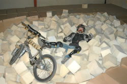 The diifficult job of getting the BMX out of the foam pit